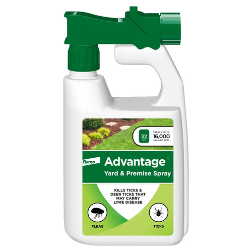 White plastic spray bottle with green nozzle and Advantage Yard & Premise Spray label