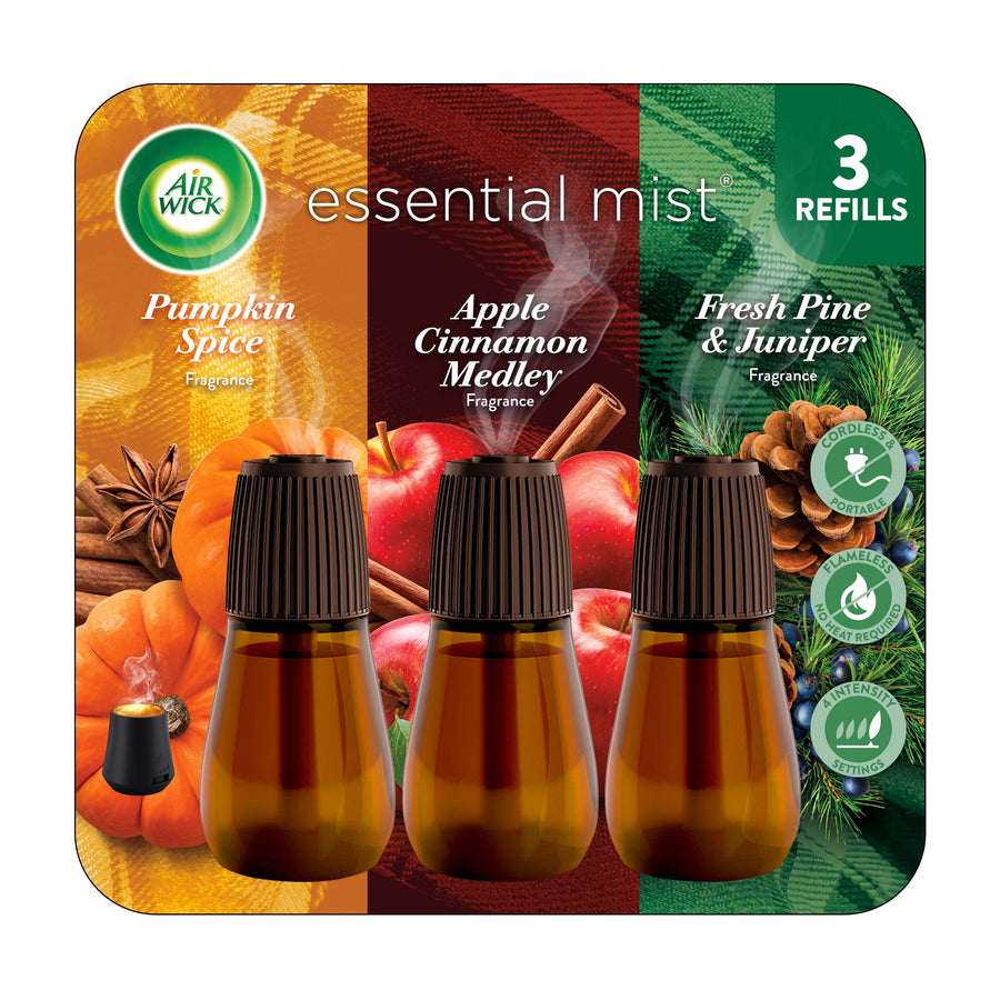 Retail pack showing three amber Air Wick Essential Mist refill bottles with pumpkin, apple cinnamon and pine graphics