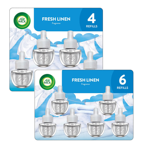 Two overlapping Air Wick Fresh Linen refill blister cards showing clear plug-in oil refill bottles