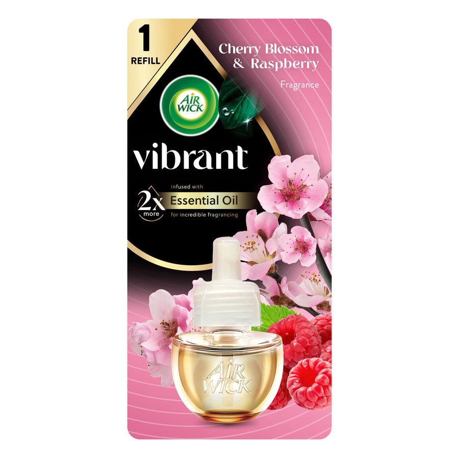 Air Wick Vibrant cherry blossom and raspberry plug-in scented oil refill in retail blister pack with floral and raspberry artwork