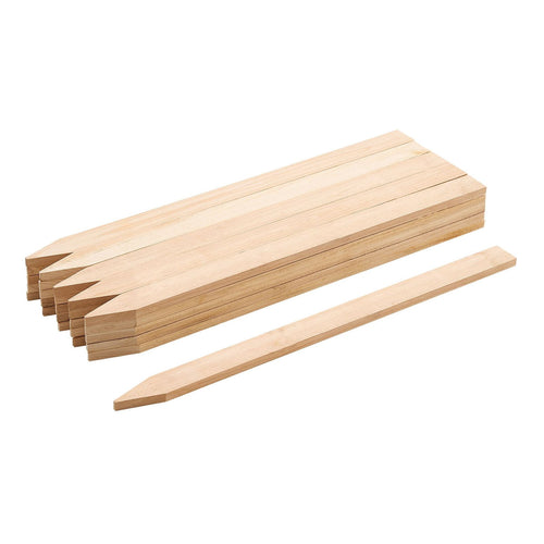 Stack of pointed natural fir wooden garden stakes arranged on a white background