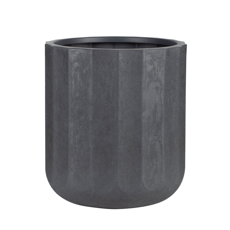Charcoal fluted resin planter with rounded base on a white studio background