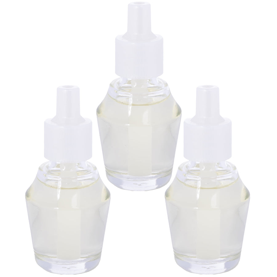 Three clear refill fragrance bottles with white caps arranged on a white background, pale yellow oil visible inside.