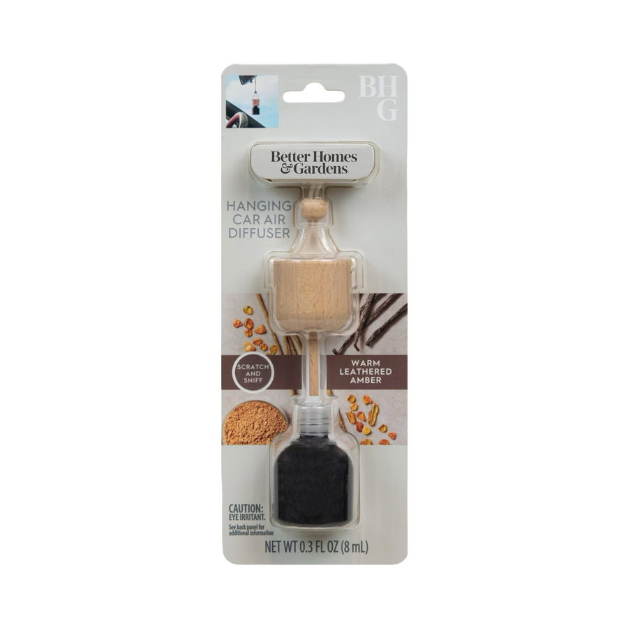 Packaged Better Homes & Gardens hanging car air diffuser with wooden top and dark fragrance bottle on branded backing card
