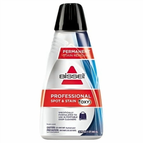 Front view of a Bissell Professional Spot & Stain bottle with red and blue labeling and black cap