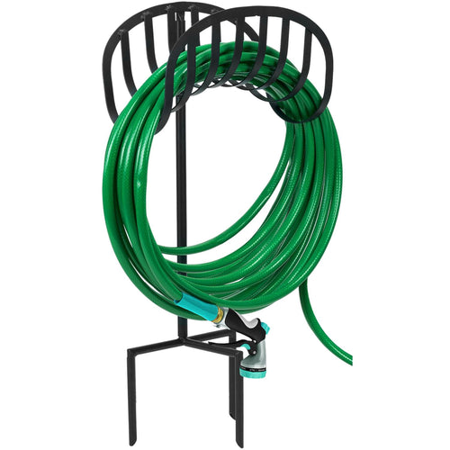 Black metal ground-mounted hose holder stand holding a coiled green garden hose with spray nozzle