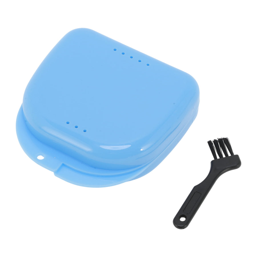 Blue plastic orthodontic retainer/braces storage case with small black cleaning brush on white background