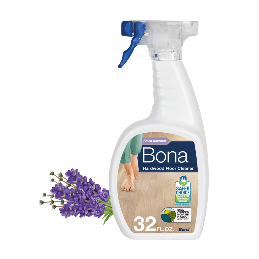 Bona hardwood floor cleaner spray bottle with lavender sprig beside it, label showing 32 fl. oz and Safer Choice seal
