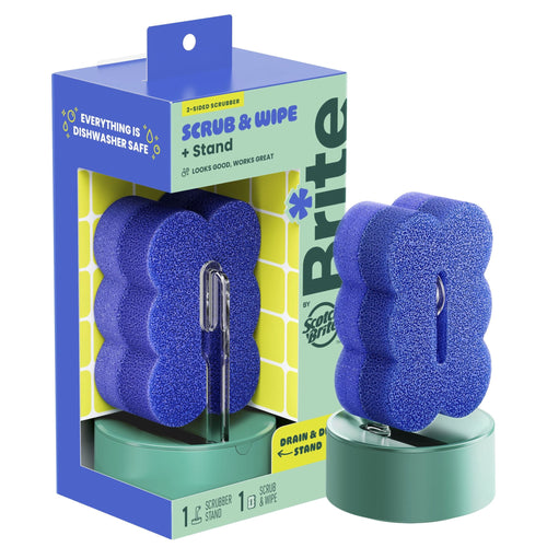 Blue flower-shaped scrub sponge displayed next to a green drain-and-dry stand in retail box packaging