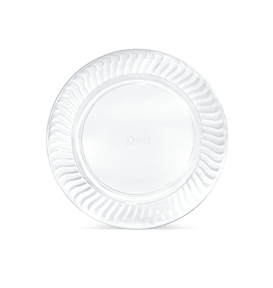 Top-down view of a single Chinet Crystal clear 10-inch plastic dinner plate with embossed Chinet logo.