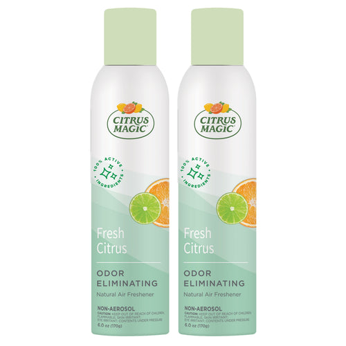 Two Citrus Magic Fresh Citrus odor-eliminating spray cans with light green caps and citrus graphics on white labels.