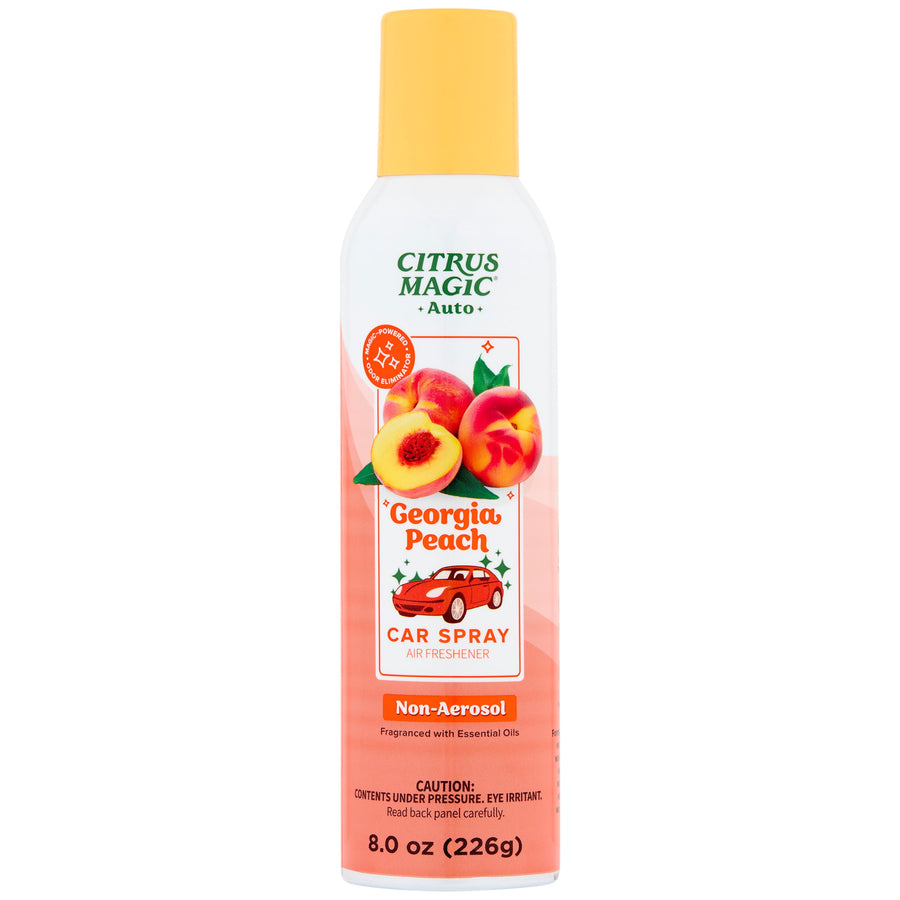 Tall Citrus Magic Georgia Peach car spray can with peach illustration and yellow cap on white background