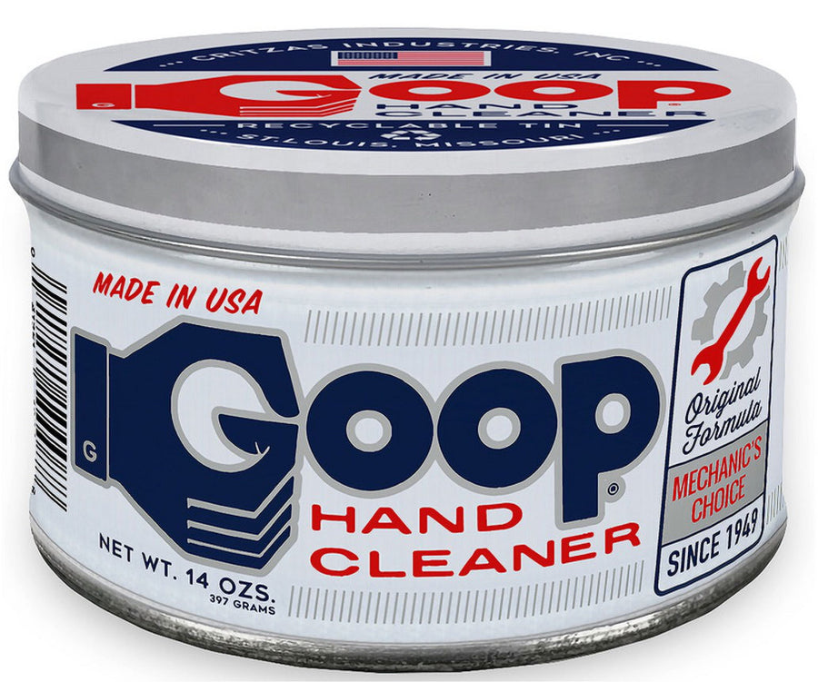 Close-up of a round metal tin of Classic Goop hand cleaner with blue and red logo label