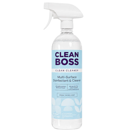 Clear spray bottle of CleanBoss multi-surface disinfectant with blue label and white trigger cap on white background