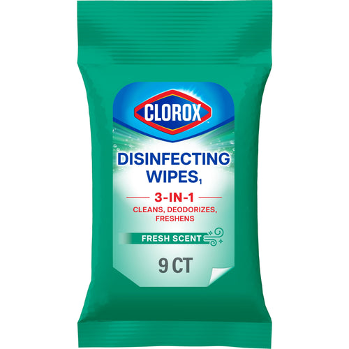 Close-up of a green Clorox Disinfecting Wipes to-go soft pack labeled fresh scent, 9 ct