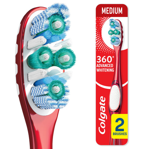 Detailed macro view of Colgate 360° Advanced Whitening toothbrush bristles beside its red medium retail card