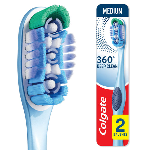 Close-up of a Colgate 360° Deep Clean toothbrush head showing multilevel bristles and polishing cups