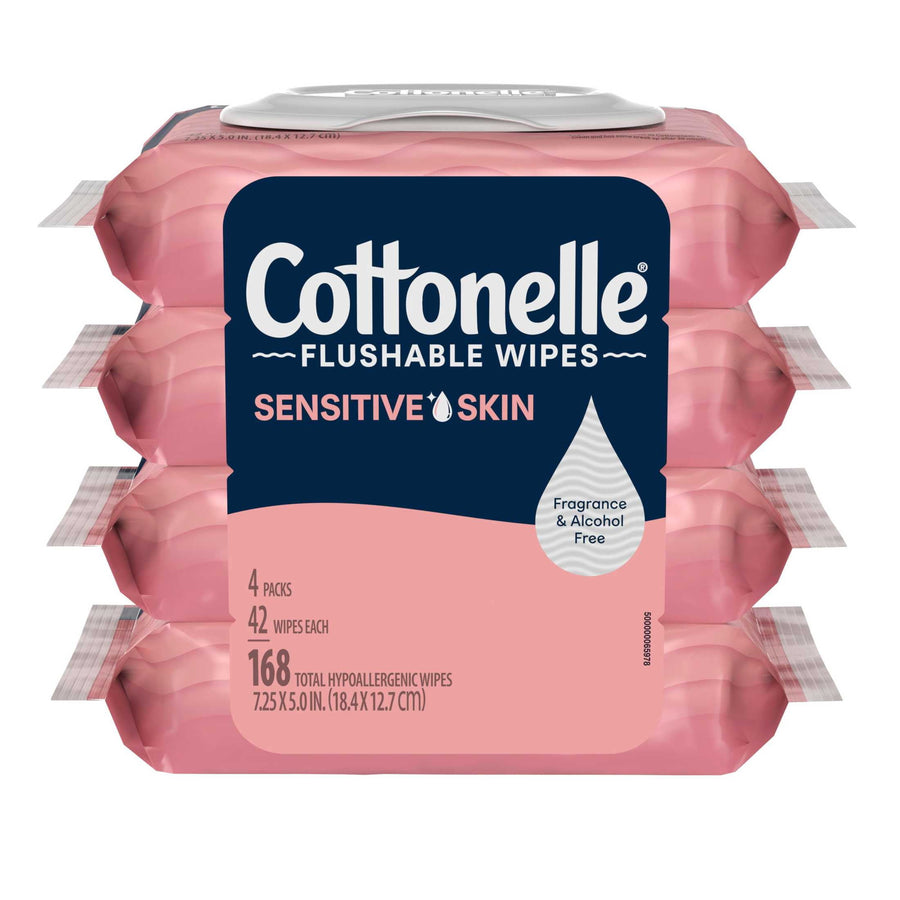 Front-facing stacked pink Cottonelle Sensitive Skin flushable wipes packs showing navy logo, droplet icon and 168 wipes callout.
