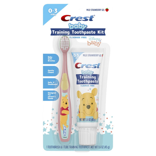 Crest Baby Training Toothpaste kit blister pack with Winnie the Pooh toothbrush and tube of mild strawberry training toothpaste