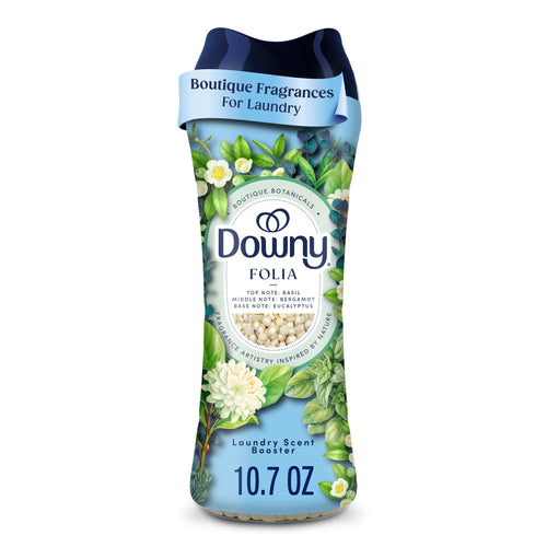Tall bottle of Downy Boutique Botanicals Folia laundry scent booster with botanical label and 10.7 oz text