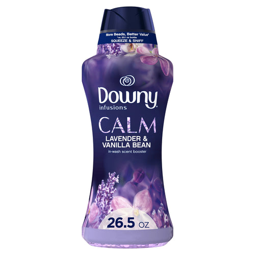 Tall purple bottle of Downy Infusions Calm in-wash scent booster, lavender & vanilla bean label and 26.5 oz callout