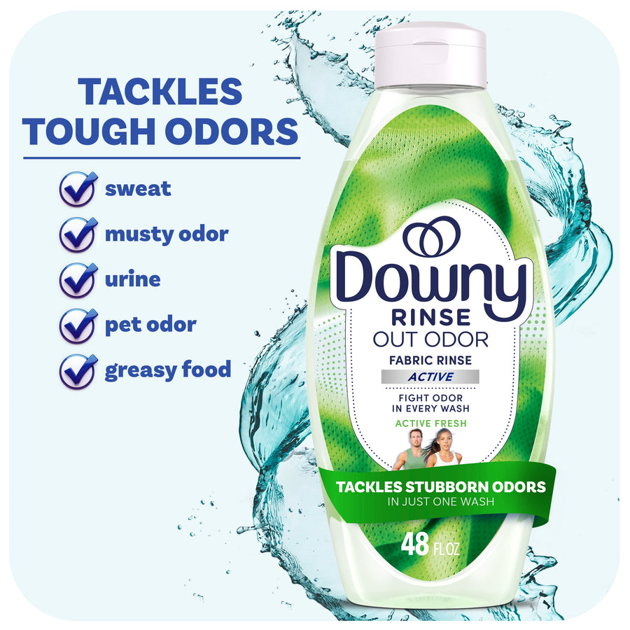 Bottle of Downy Rinse Out Odor fabric rinse with green label and splash background