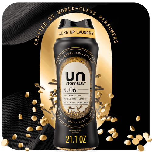 Downy Unstopables Unlimited Collection N.06 in-wash scent booster bottle with gold beads and black-and-gold packaging, 21.1 oz label visible