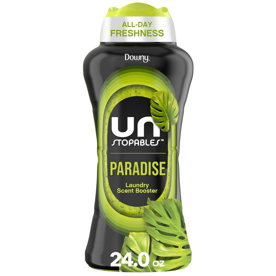 Downy Unstopables Paradise scent booster black bottle with green label and tropical leaf graphics