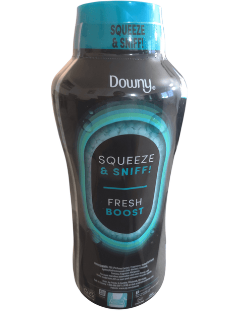 Tall black Downy Unstopables bottle with teal cap and 'Squeeze & Sniff! Fresh Boost' label