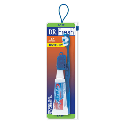 Dr. Fresh travel toothbrush kit in blister pack showing toothbrush with cap and a small toothpaste tube on gradient background.