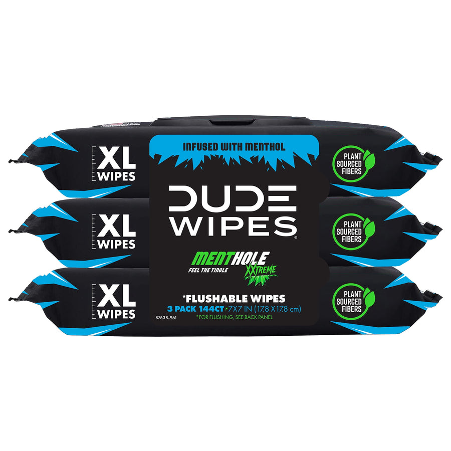 Three-pack of DUDE Wipes MentHole XL flushable wipes shown front-on with black packaging and blue-green graphics.