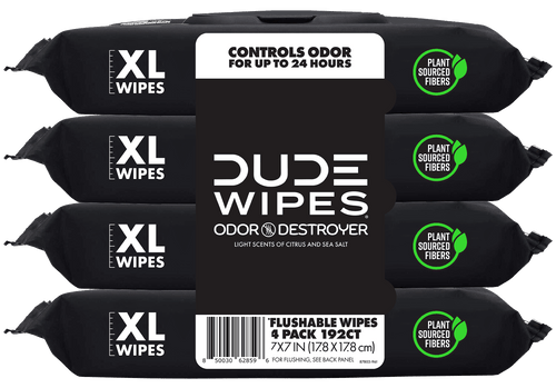 Four stacked black DUDE WIPES Odor Destroyer XL packs with visible brand label and plant-sourced fibers badge