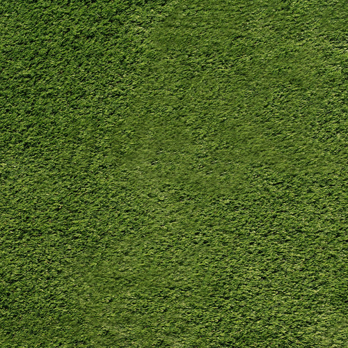 Close-up texture of dense emerald-green artificial grass turf showing short, even synthetic fibers.