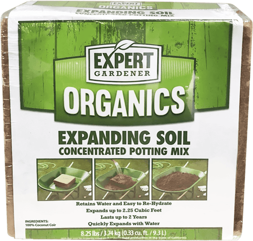 Square wrapped brick of Expert Gardener Organics expanding soil with green label and product photos