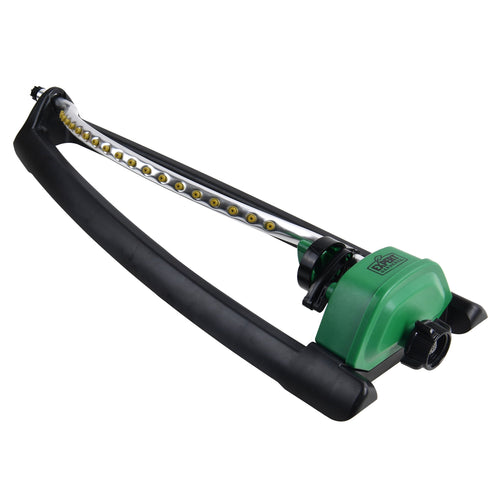 Green and black Expert Gardener oscillating sprinkler lying on white background showing nozzle bar and base