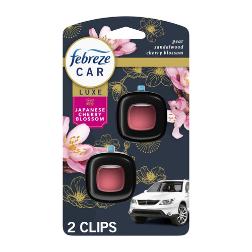 Febreze Car Luxe Japanese Cherry Blossom vent-clip packaging showing two black clips and floral art
