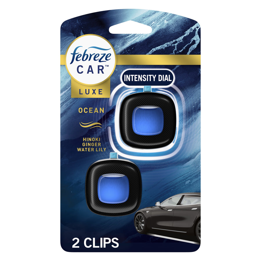 Febreze Car Luxe Ocean vent clip retail blister pack showing two black clips with blue gel.