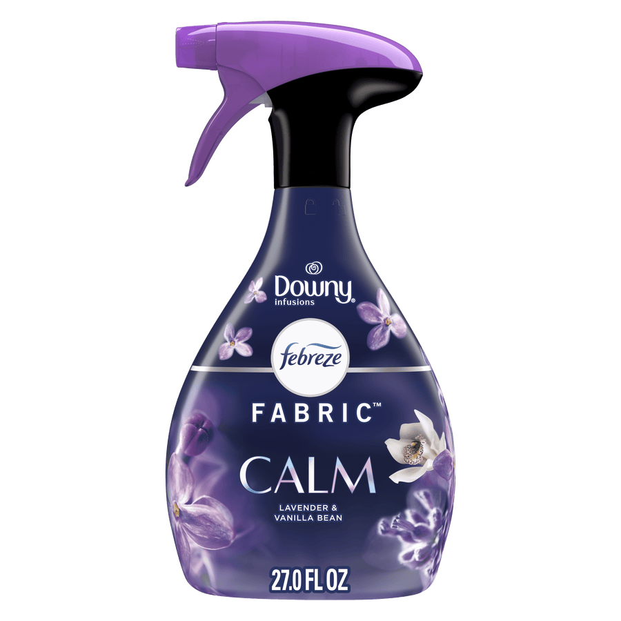 Bottle of Febreze Fabric Calm (Downy infusions) spray with purple trigger and floral label on white background