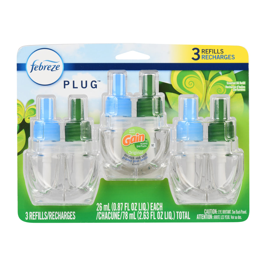 Blister pack of three Febreze Plug scented oil refill cartridges labeled Gain Original with green and blue caps.