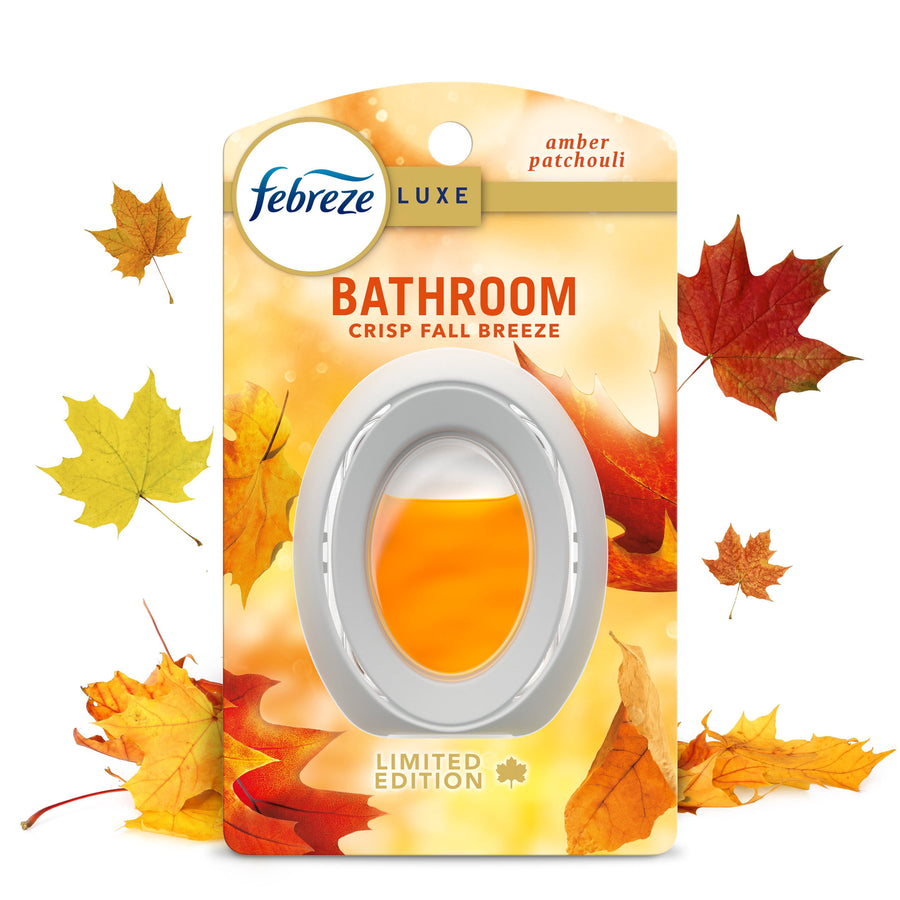 Febreze Luxe Bathroom Crisp Fall Breeze packaged air freshener with autumn leaves and orange scent vial visible