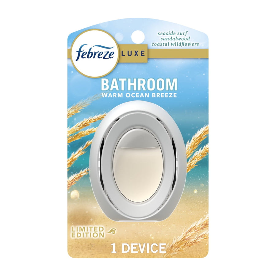 Febreze Luxe bathroom oval air freshener device in blister card packaging with warm ocean breeze branding