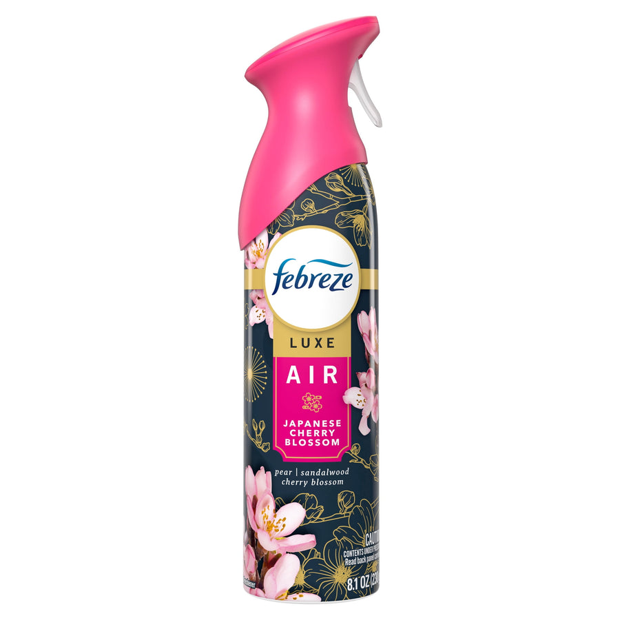 Febreze Luxe Air aerosol can in Japanese Cherry Blossom scent with pink cap and floral label on white background