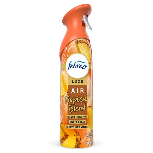 Febreze Luxe Air Mist bottle in tropical-orange packaging labeled 'Tropical Blend' with pineapple imagery.