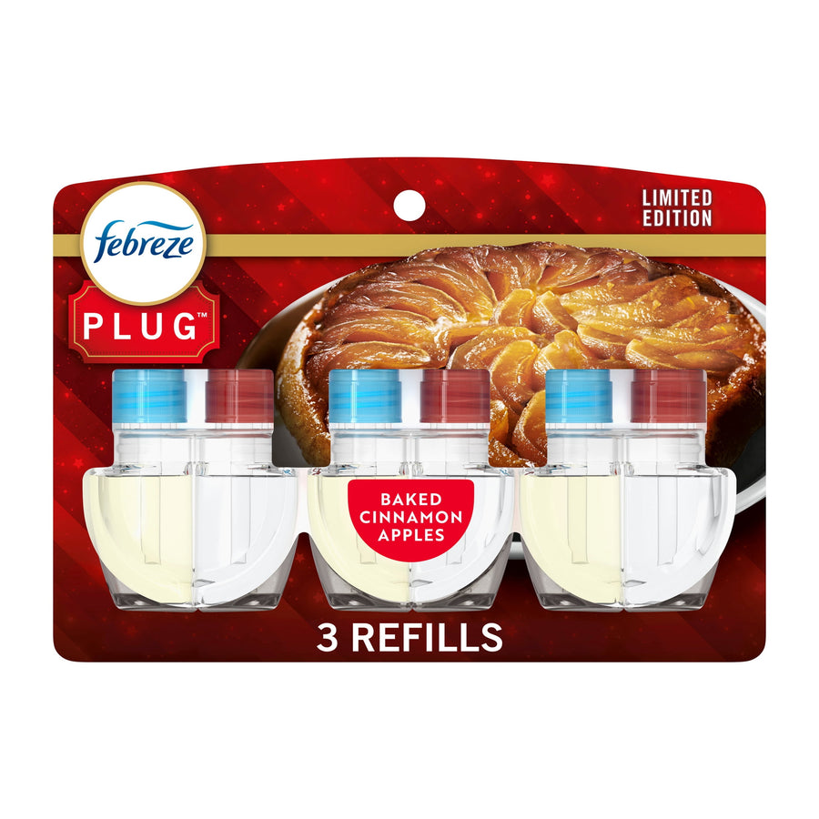 Febreze Plug refill blister pack showing three clear oil refills with baked cinnamon apples packaging artwork.