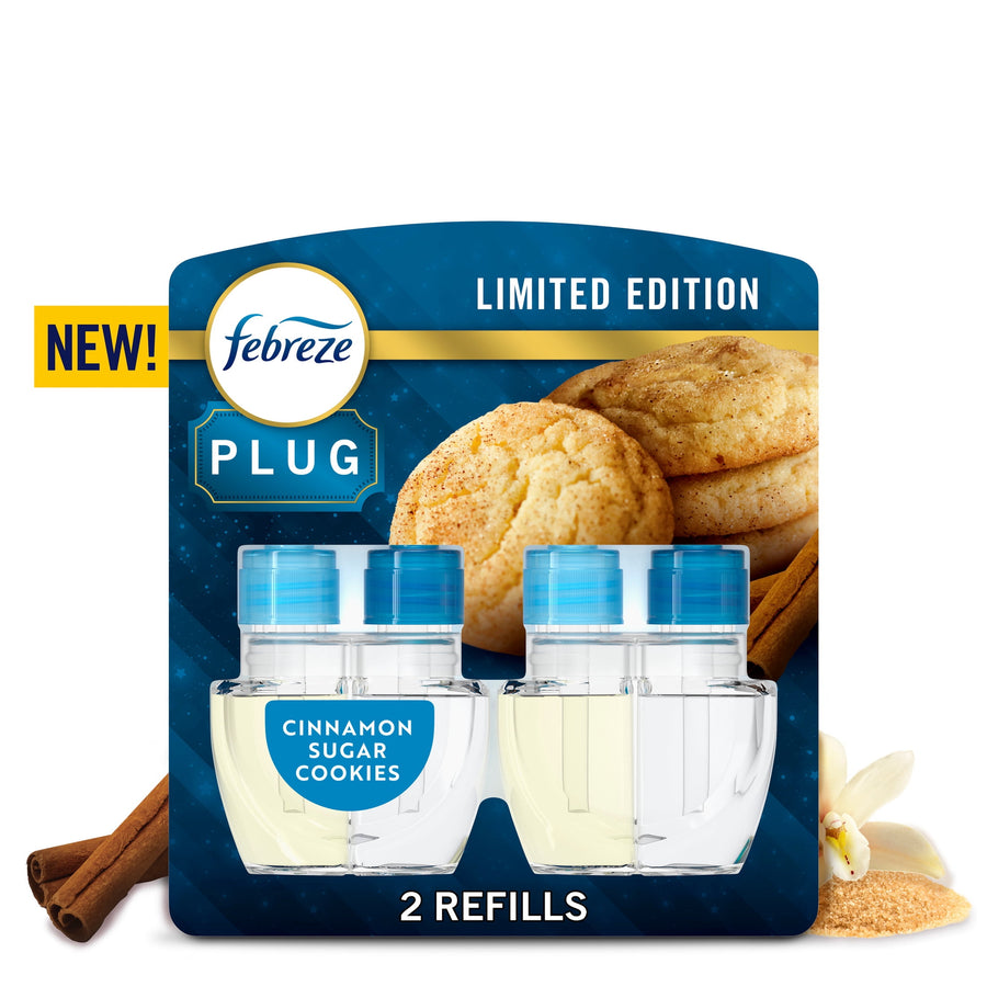 Febreze Plug cinnamon sugar cookies scented oil refill retail blister pack showing two refill bottles and cookie imagery.