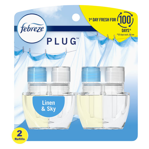 Packaged Febreze Plug air freshener refill twin pack labeled Linen & Sky with clear refill bottles and blue accents.