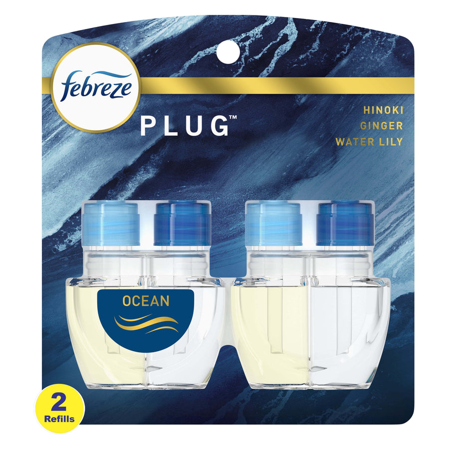 Front-facing Febreze Plug scented oil refill blister pack labeled Ocean showing two refill bottles against a blue marbled backing