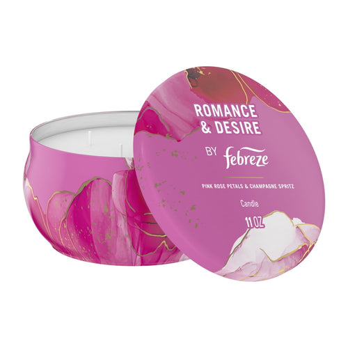Pink Febreze Romance & Desire scented candle in an open decorative tin showing four wicks and matching lid