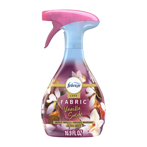 Febreze Luxe Fabric Vanilla Suede spray bottle on white background with floral label and 16.9 FL OZ text.