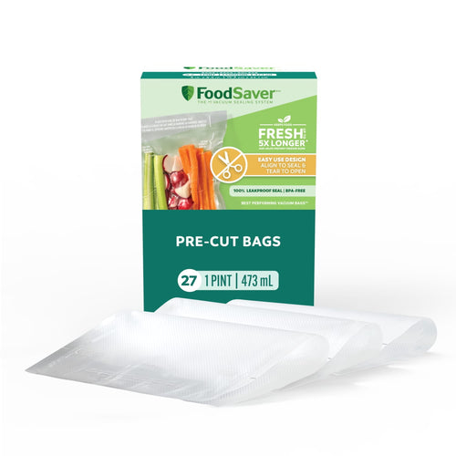 Boxed FoodSaver pre-cut pint vacuum seal bags displayed with three empty textured bags in front